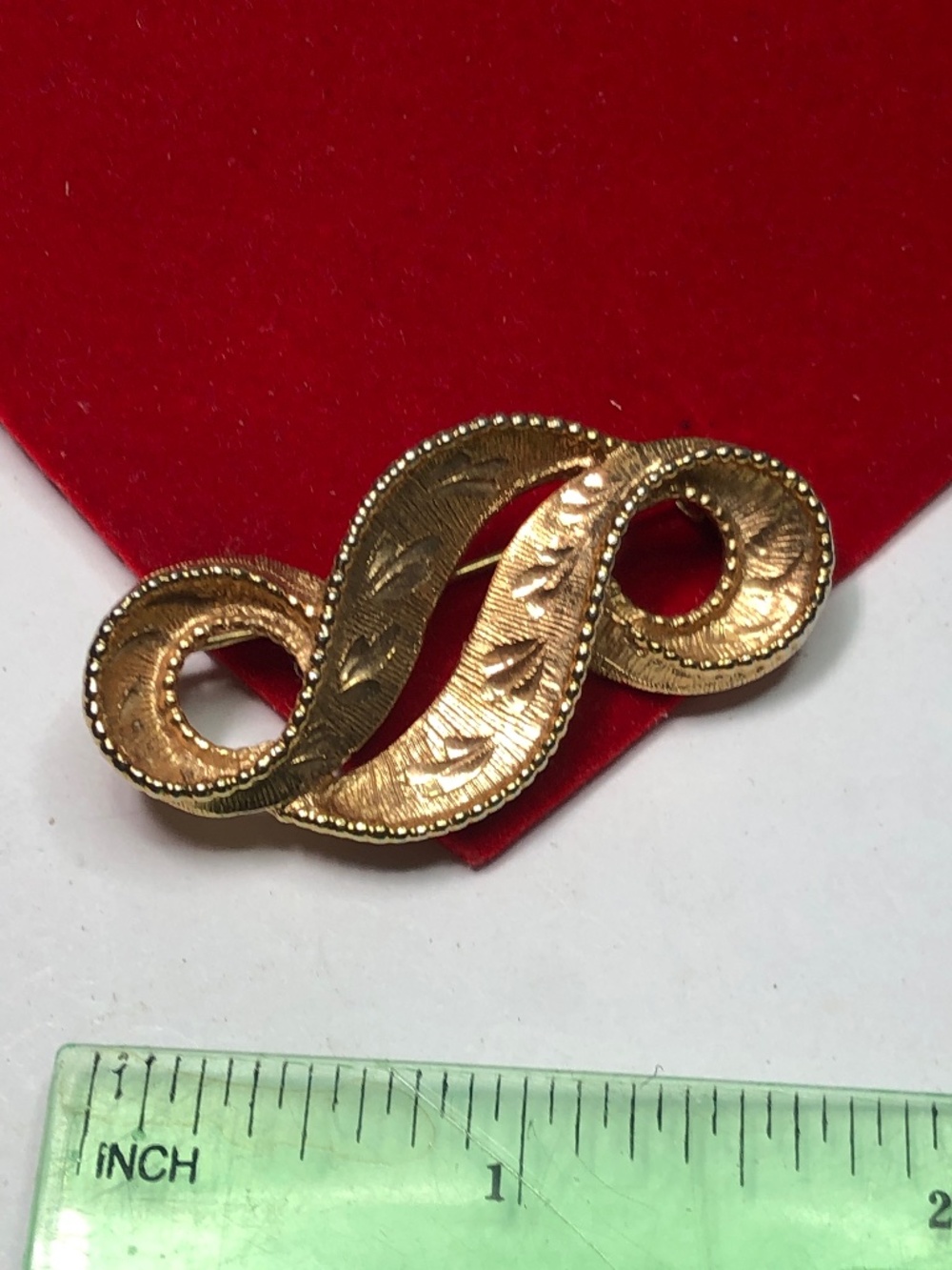 Swirl brooch gold tone engraved vintage